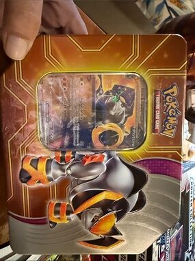 Pokemon Tin with Orange, Gold, Black Artwork